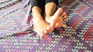 Indian MILF rubbing her beautiful feet with oil