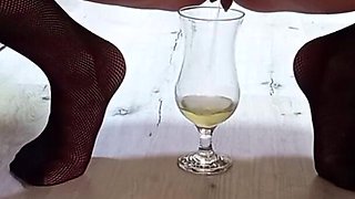 A glass of pee from a mature sexy woman