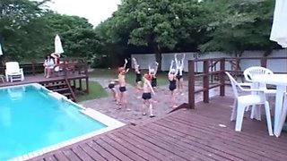 junior gang with family in a swimming class