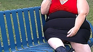 Nurse Vicki Smoking in the Park on a Bench All Dressed up