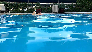 Couple Underwater Diving and Swimming