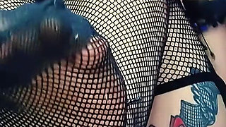 Gothic Babe in Sexy Lingerie Masturbates with a Big Dildo and a Plug in Her Anus