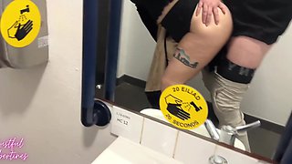 Cheeky milf takes a whole load of heavy cock in public toilet