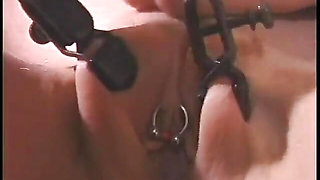 Redhead mistress spanks her two whores