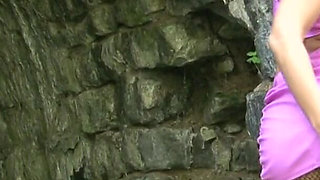 Blonde slut posing for pictures by the tunnel