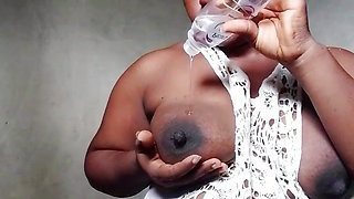 Matured woman  giving  her pussy sweet massageYou can't definitely resist this African Black woman's boobs