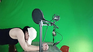 Me and my steps sit in front of the green  screen