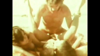 Hot Threesome on the Beach From the American Vintage Porn of the Seventies