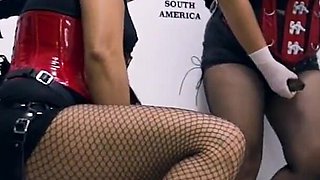 2 Asian Dominas Pegging Slave