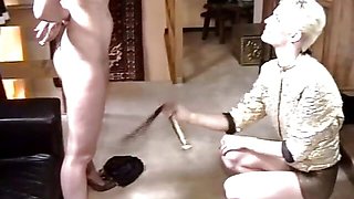 Latex chick punishing her lesbian friend