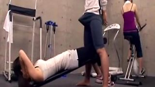 Japanese tutor acquires erection at the gym