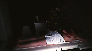 body and foot massage with a massage gun and hands