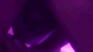 Young Girl Using Her Feet to Play with the Dildo While Masturbating