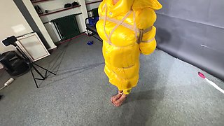 Ms Ungeniert Tied, Gagged And Hooded In Shiny Nylon Yellow Downjacket