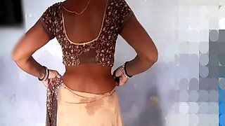 Perky housewife Sukunmi with big nipples shows off in a bikini