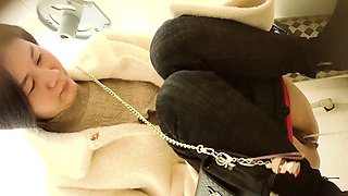 Cute amateur asian web cam girl playing with her toy