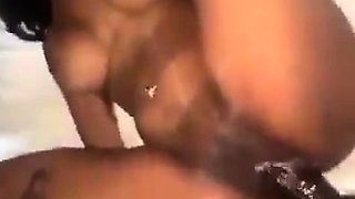 Busty curly brunette with big boobs fucks on couch