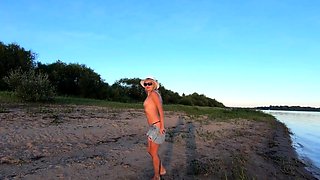 Russian Nudist on the River Shore