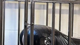 Anal Stretching a Caged Gimp