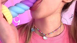 Toy in Mouth with an Innocent Stare