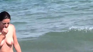 Nudist girls exposed by voyeur cam on beach