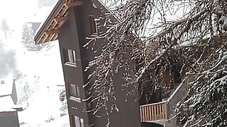 On the Balcony with Snow