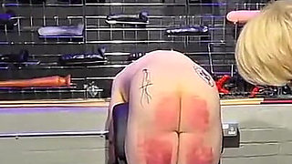 Slave in Chastity Cage Gets a Cruel Caning