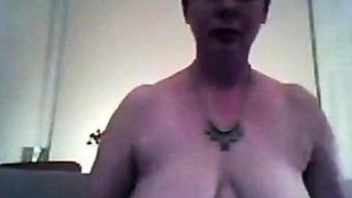 Busty mature brunette shows off her big natural saggy tits o