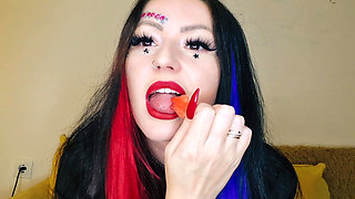 Food fetish. Dominatrix chews gummies. Teeth fetish, chewing fetish