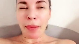 Busty curly brunette with big boobs fucks on couch