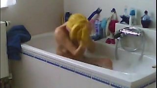 Spied Shaving Her Pussy In Bath