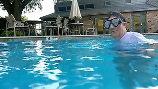 Couple Underwater Diving and Swimming