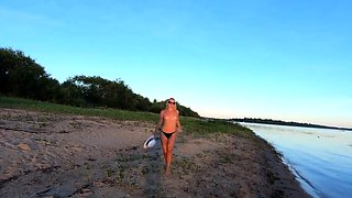 Russian Nudist on the River Shore