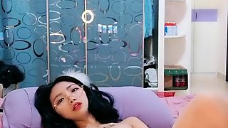 Japanese teen uses toys to pleasure pussy
