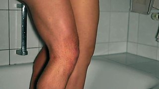 Hot blonde with sexy curves makes her boyfriend feel good in the shower