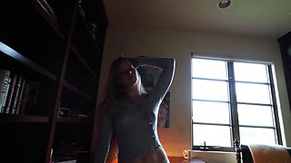 Stunning young babe performs slow and sensual striptease