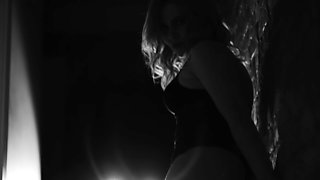 Chick from SugarNadya dances in black and white