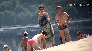 Spy cam has spotted some nude beach sex couple