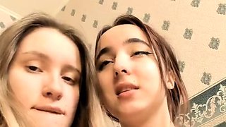 Blonde and brunette lesbian teen belles play