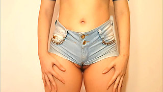 Wife in micro shorts without panties