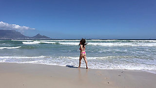 Stripping and Frolicking on a Beach