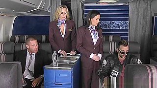 Air hostesses foursome fucking on flight