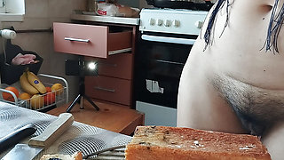 Hot mom prepares naked food in the kitchen. Amateur wife with hairy pussy, big tits, big ass.