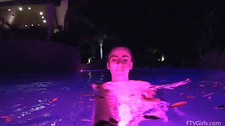 Natural tits brunette Lily swims in the pool and masturbates.