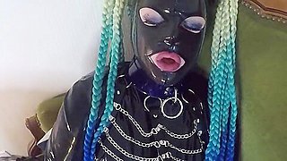 Miss Maskerade Latex doll blowjob dildo in full rubber and hood.