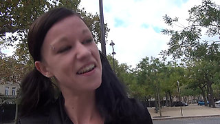 Vanessa , a pretty brunette, shows off on the Champs Elysees