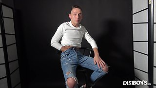 Solo boy jerking his chubbies young penis on the chair