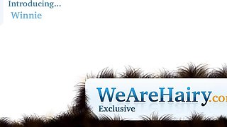 Winnie plays with her hairy pussy