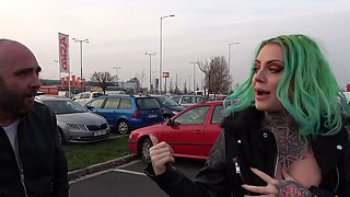 Green haired beauty is fucked in a van