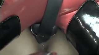 Crazy Asian chick with a latex fetish blows a black rod and is nailed